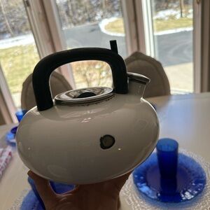 vintage Copco white enamel whistling tea kettle designed by Sam Lebowitz
